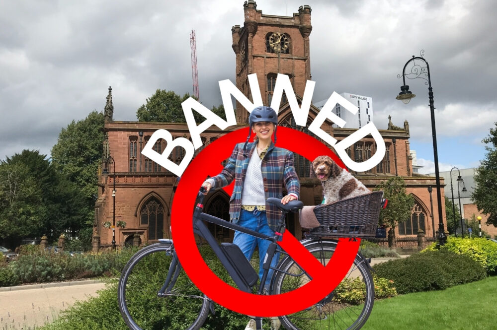 Woman with e-bike in Coventry