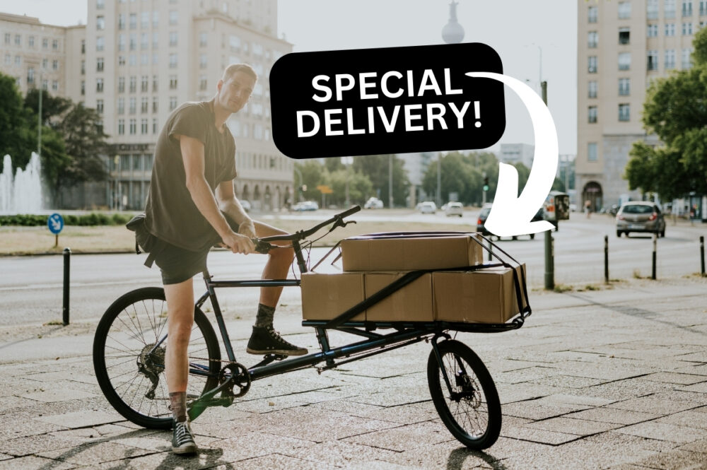 Man with cargo bike carrying packages