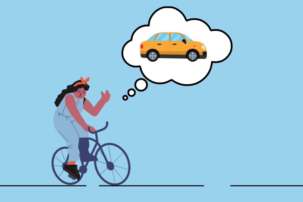 Cyclist thinking about a car