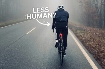 Cyclist on road wearing helmet and lycra